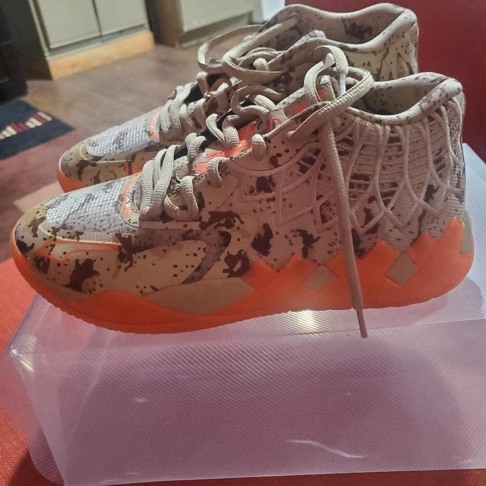 Camouflage Sneakers with Orange Accents